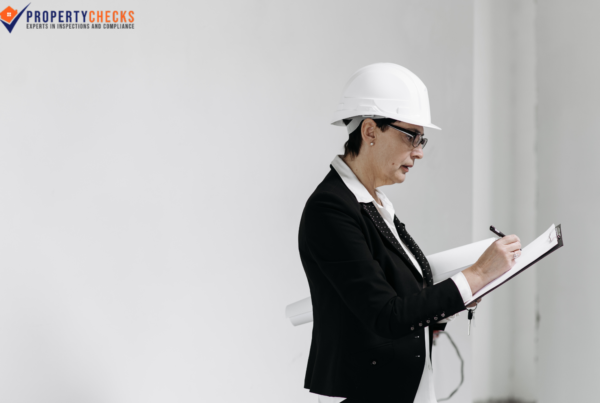 property inspector in white helmet