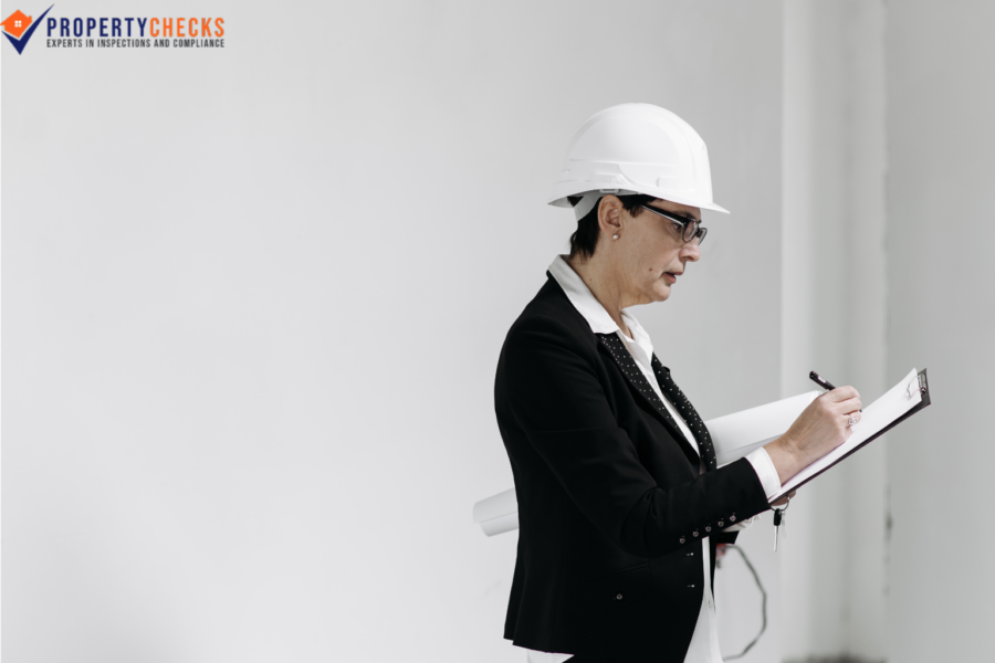 property inspector in white helmet